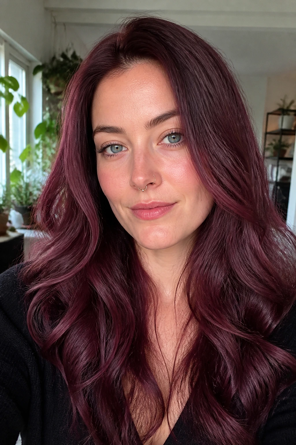 Portrait of a woman with Amethyst Mahogany hair in violet-tinted mahogany