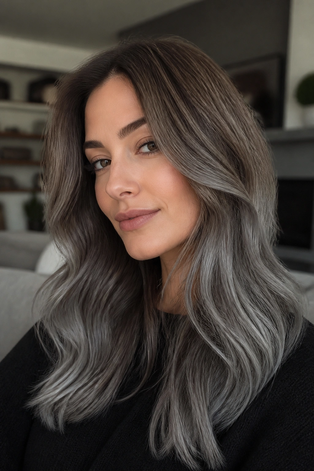 Close-up portrait of woman with ash brown to steel gray melt