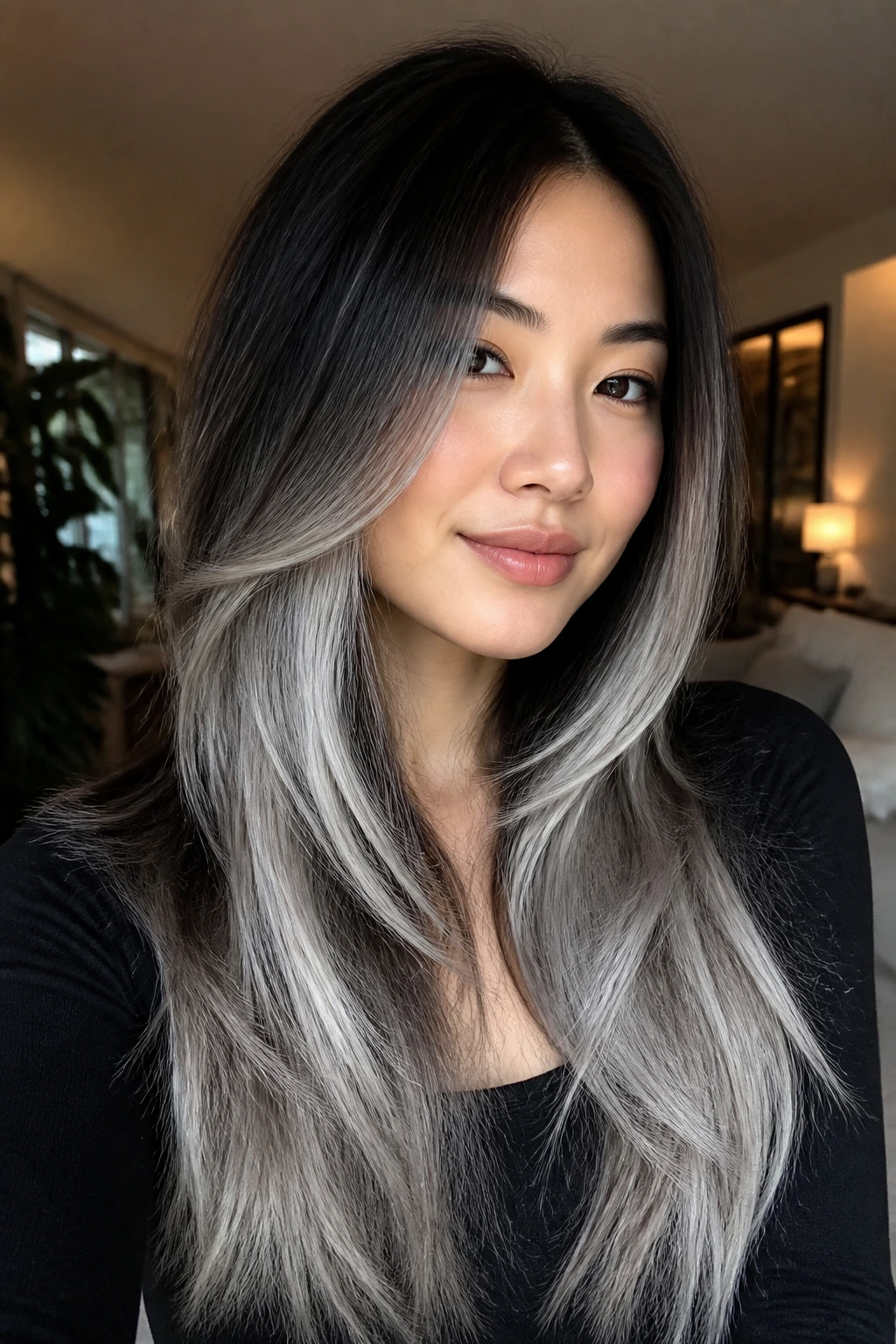 Long layered hair with ash white balayage on a real person