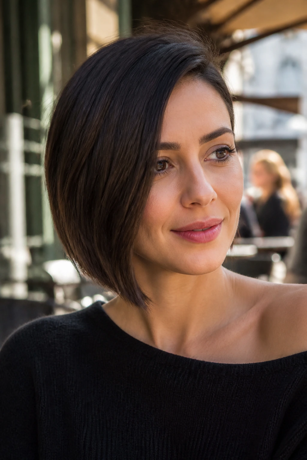 Close-up portrait of a real person with an asymmetrical bob haircut in daylight