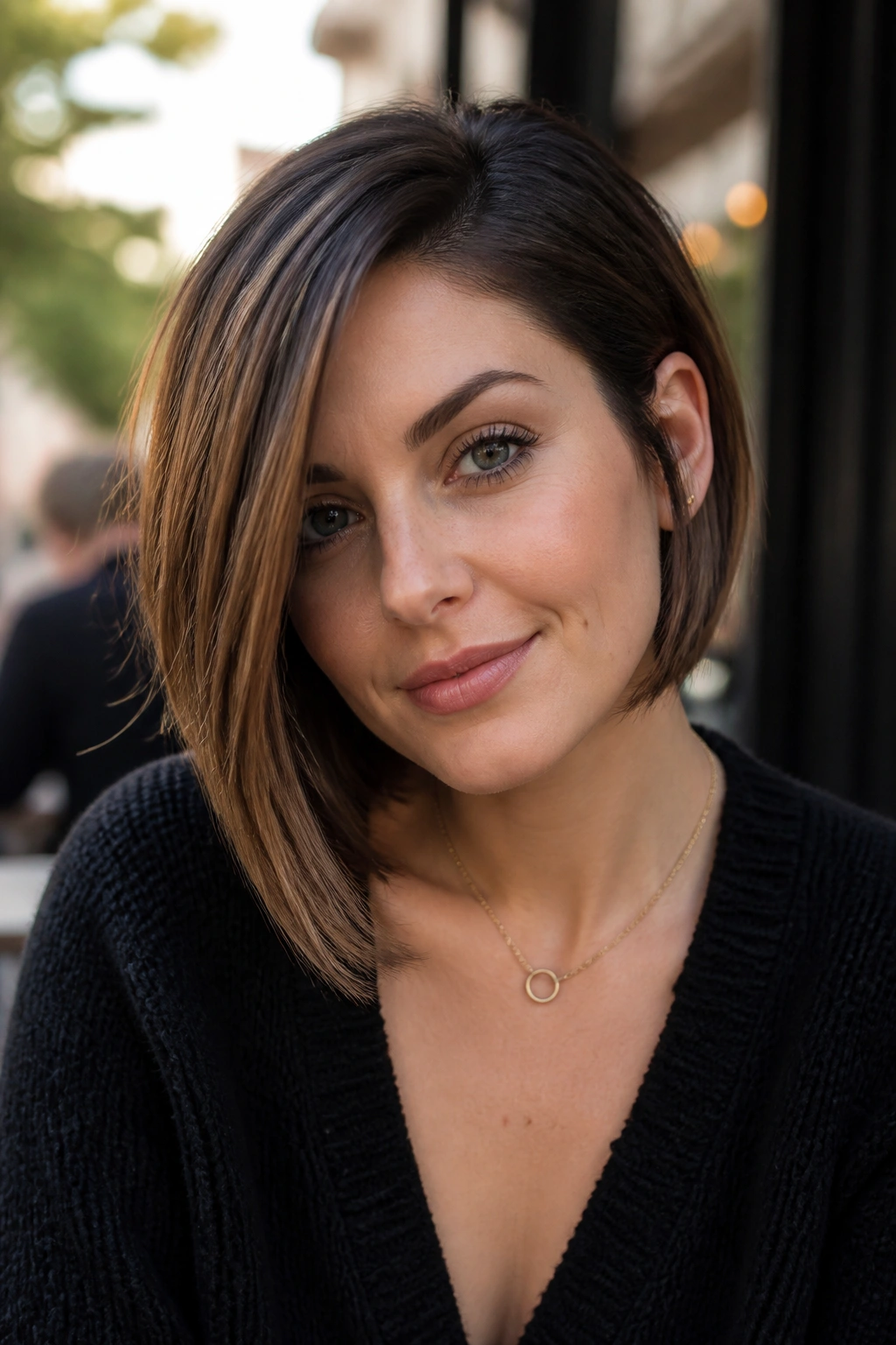 Portrait of a real woman with an asymmetrical bob and deep side part
