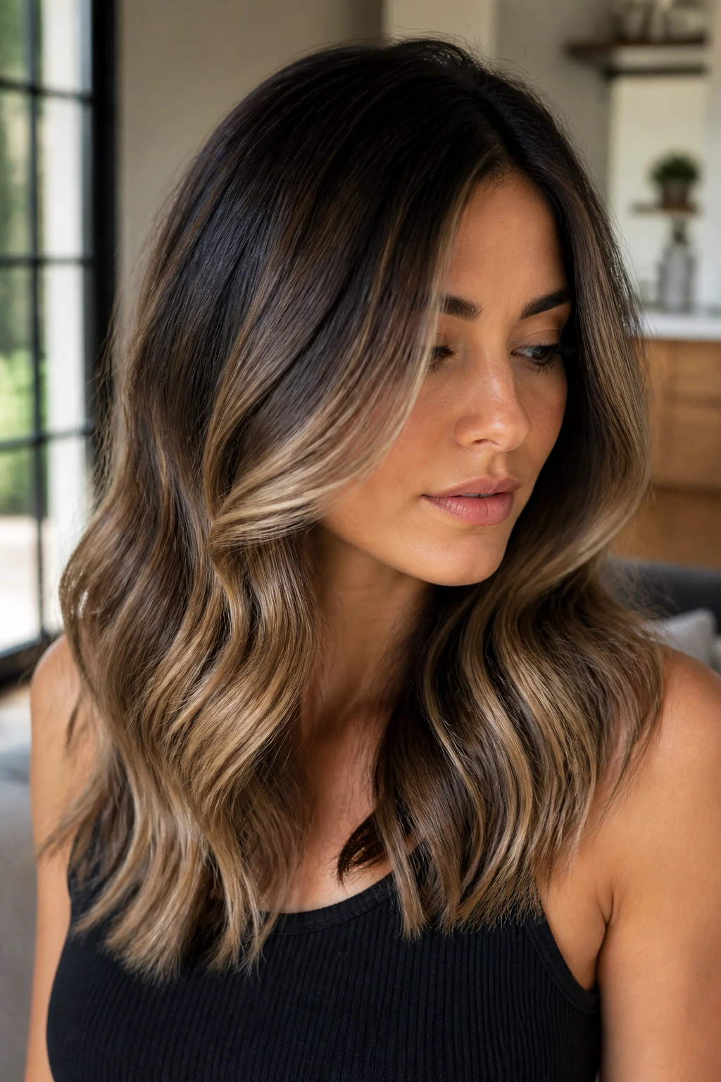 Espresso hair with beige blonde balayage mid-lengths and ends on a real person