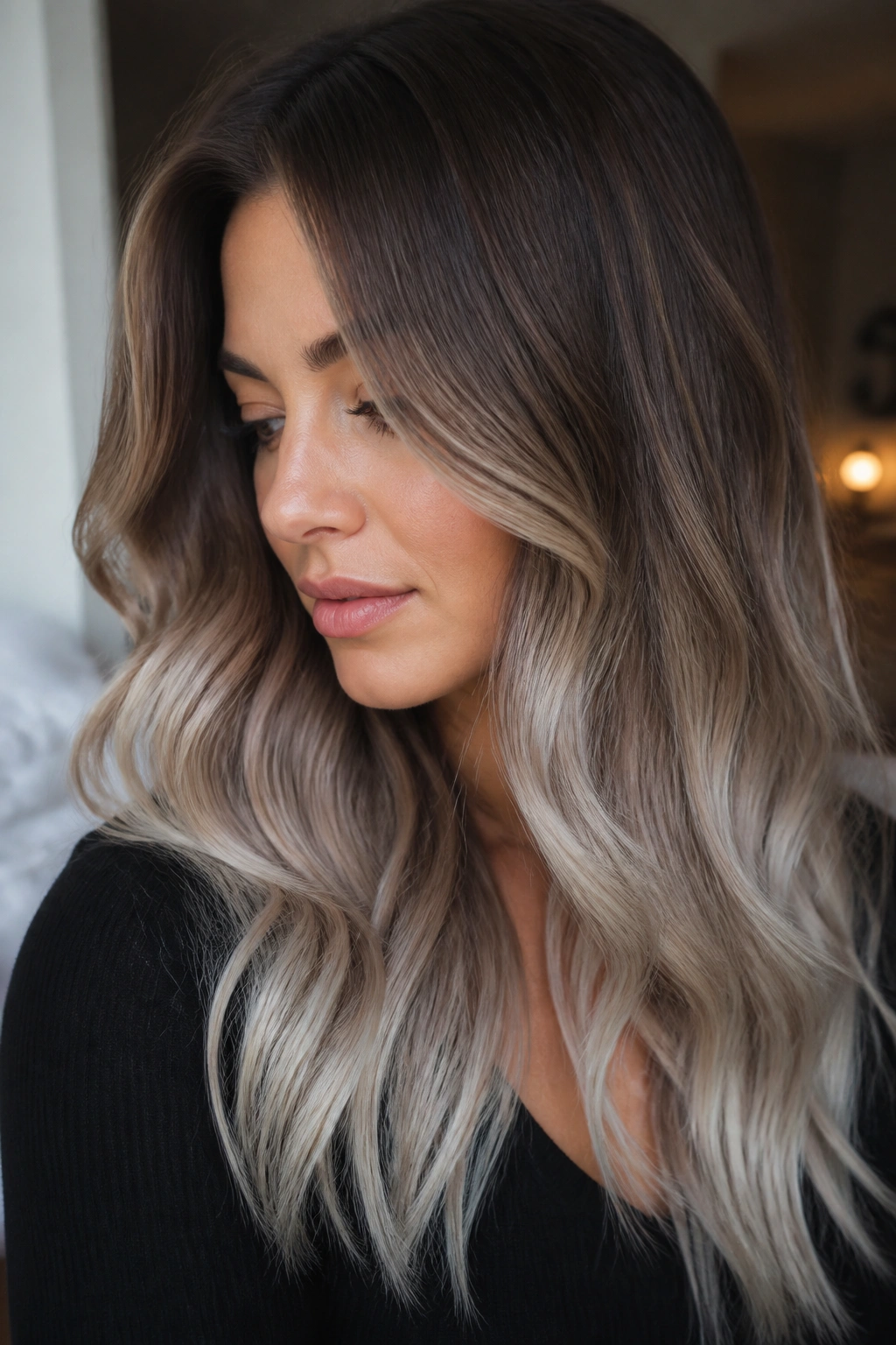 Medium brown hair with beige-to-silver gradient.