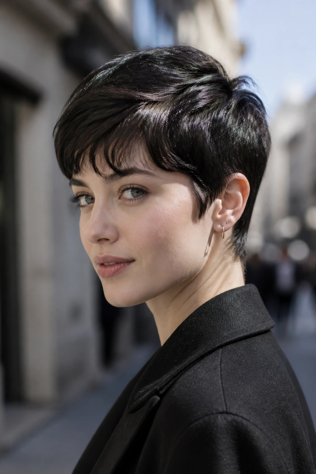 Close-up portrait of a real person with a glossy black-brown pixie cut