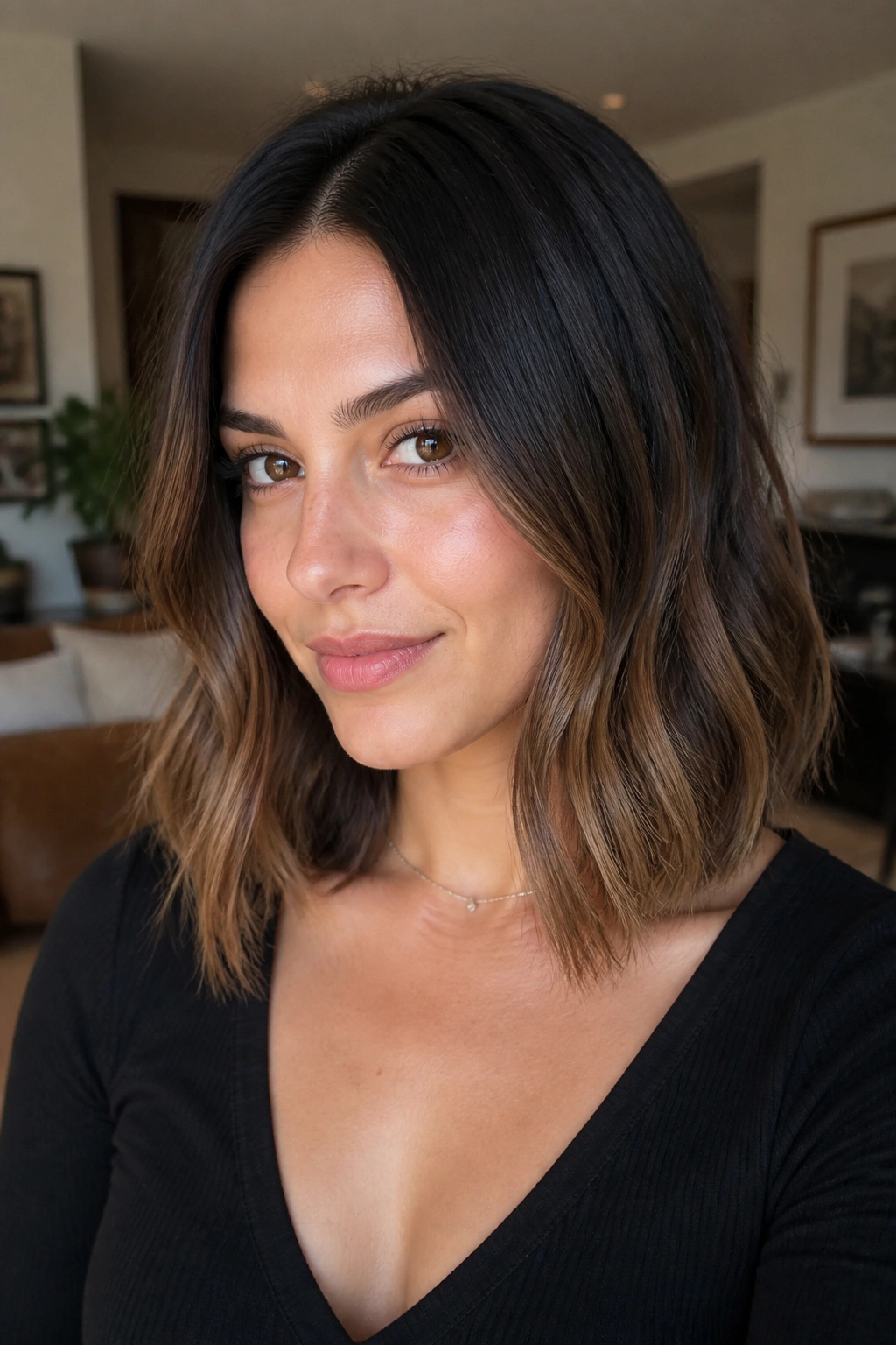 Close-up of real woman with black to mocha lob and soft bend