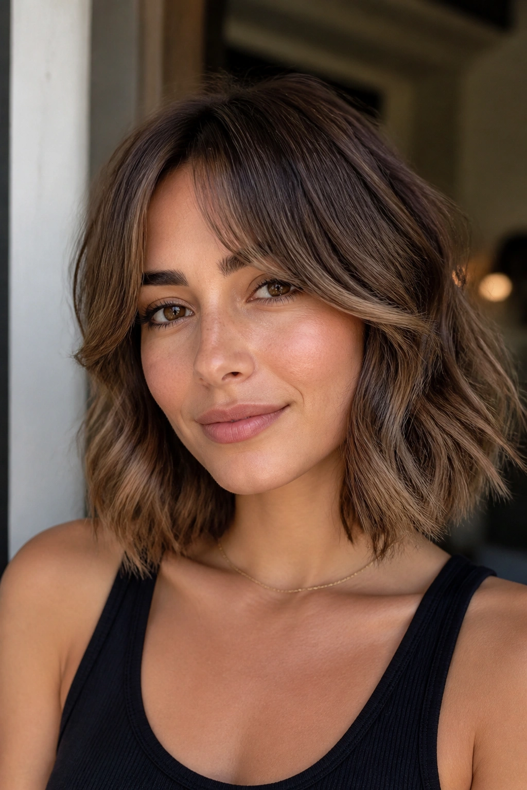Close-up of a real woman with a bottleneck bang lob