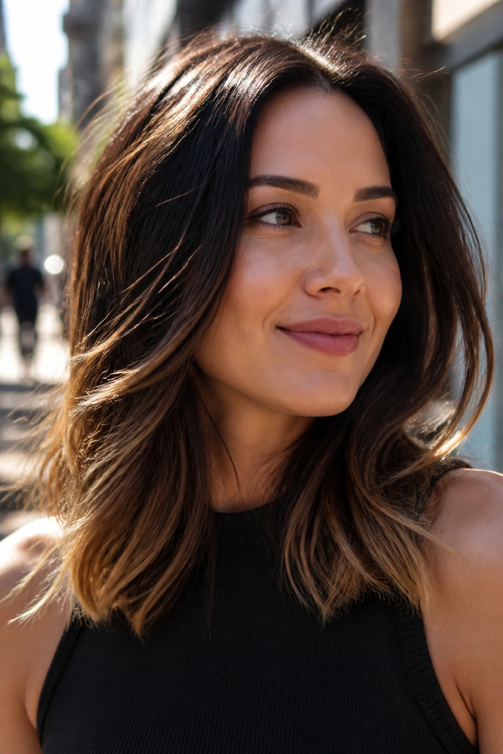 Close-up of brunette with soft-brunette ombre from root to ends