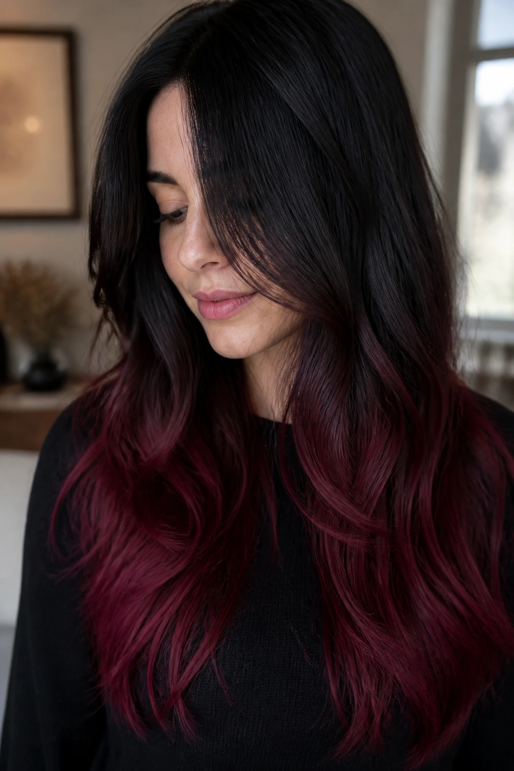 Close-up of real person with burgundy ombré ends on long hair
