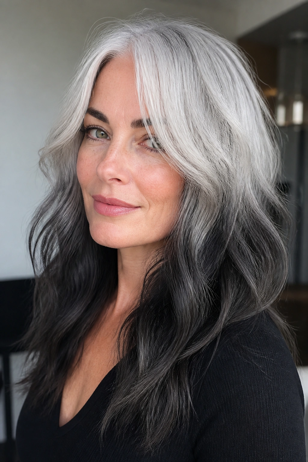 Portrait of a real woman with charcoal-silver reverse ombre hair