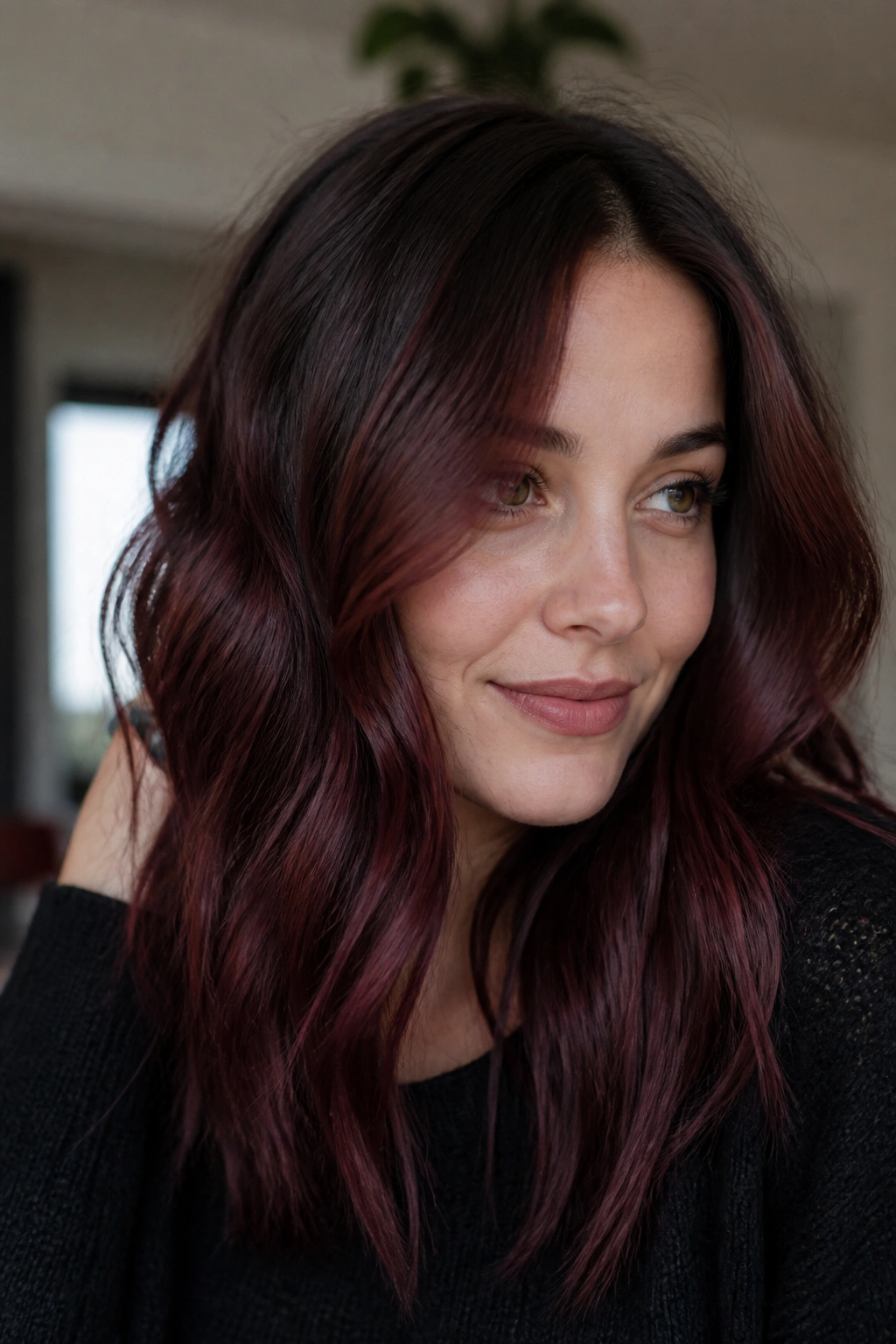 Portrait of a woman with chocolate raspberry brown hair in natural light