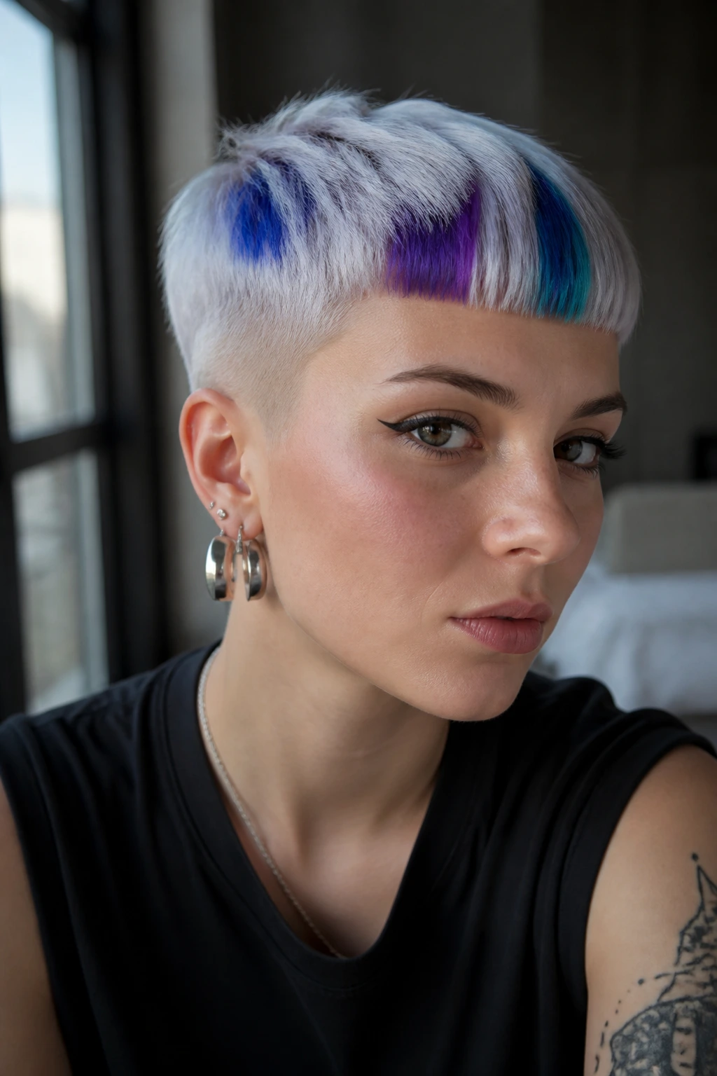 Portrait of a real person with Chrome Rainbow Crop featuring silver base and cobalt, violet, aqua panels.