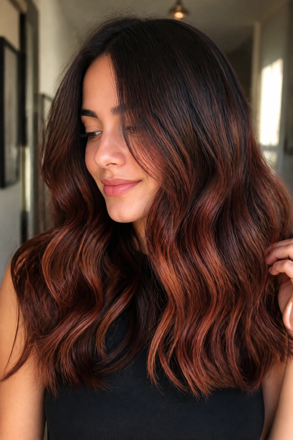 Close-up portrait of cinnamon red balayage on brown hair