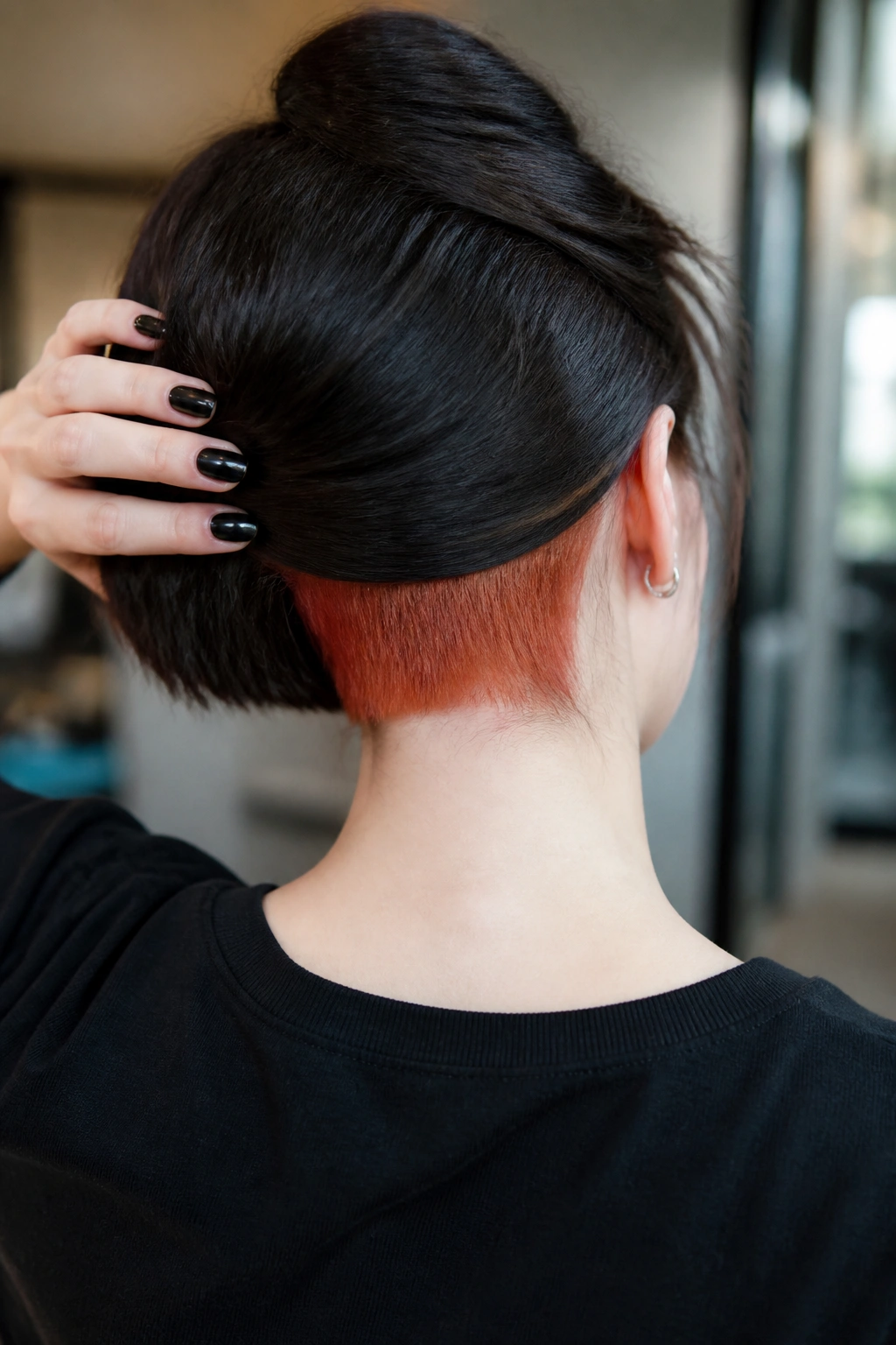 Real person with narrow color-blocked nape panel under hair