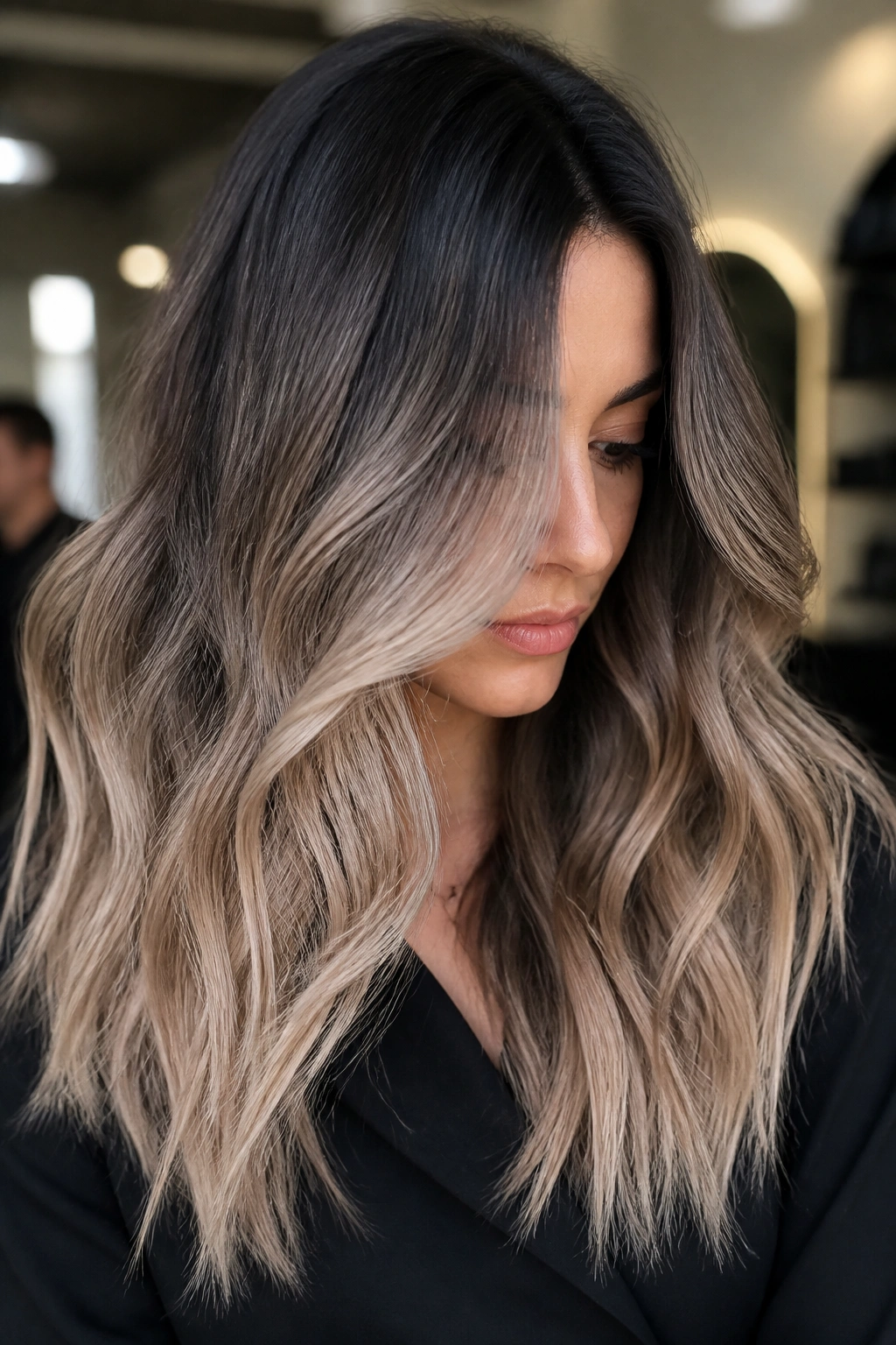 Close-up brunette with cool beige ends and smoky root