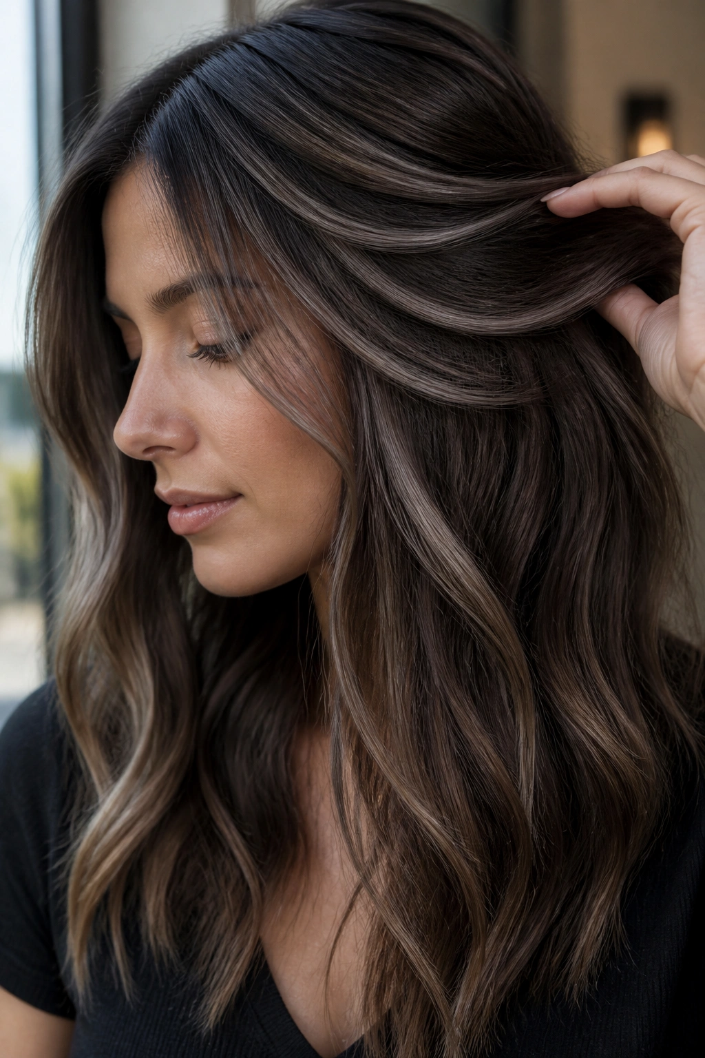 Ash brown hair with cool cocoa panels for a sleek, cool-toned look
