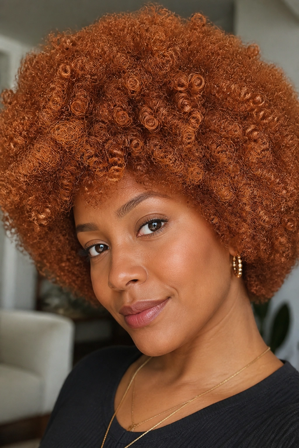 Close-up of a real person with copper penny Afro in natural light