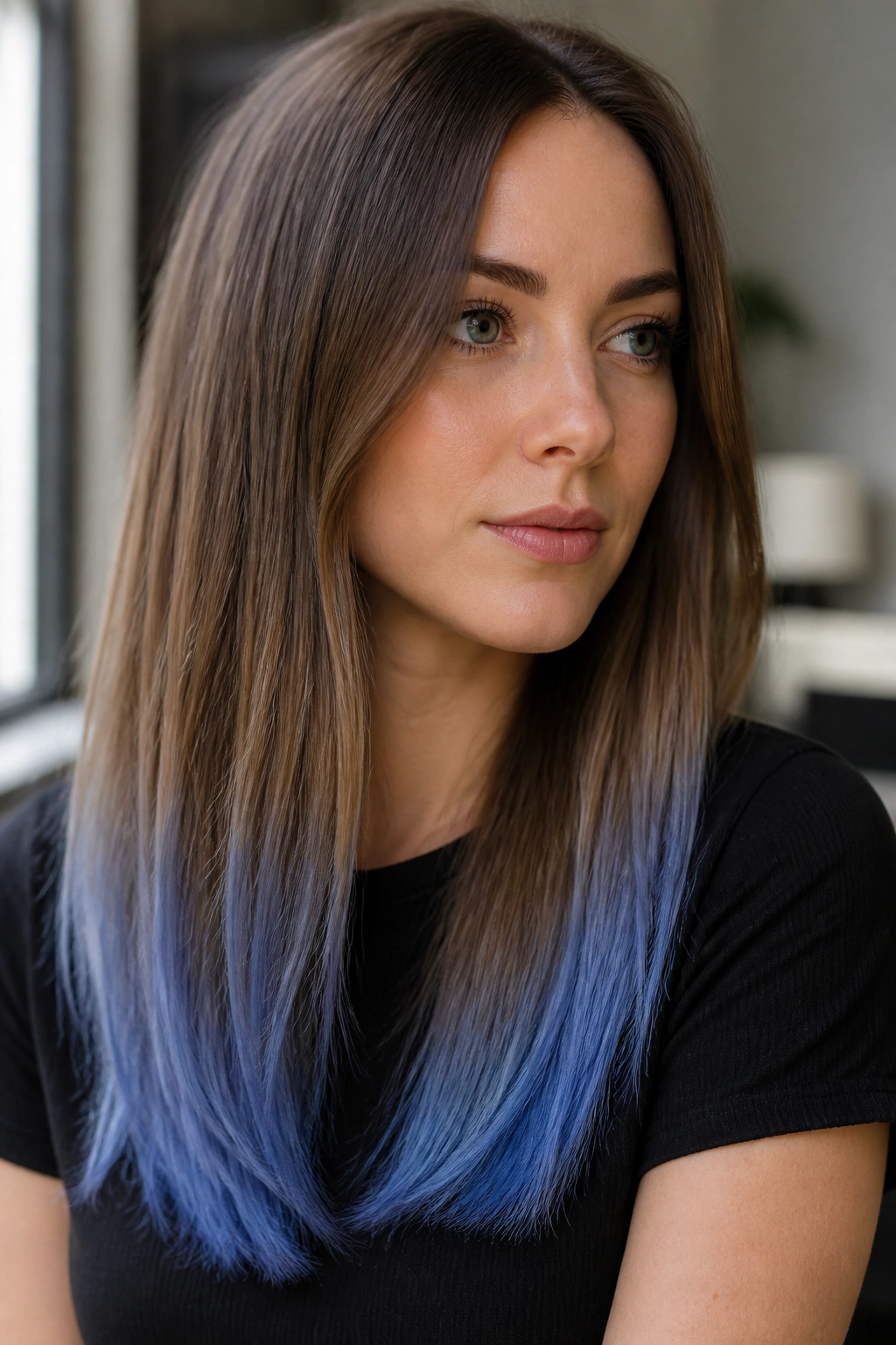 Close-up of hair ends dyed cornflower blue on a real person.
