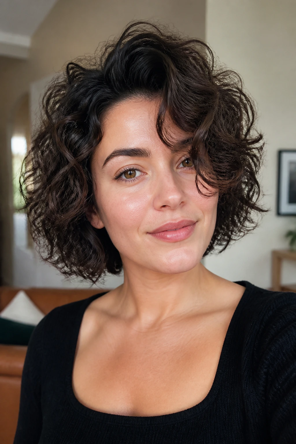 Portrait of a real woman with curly bob and high-volume roots