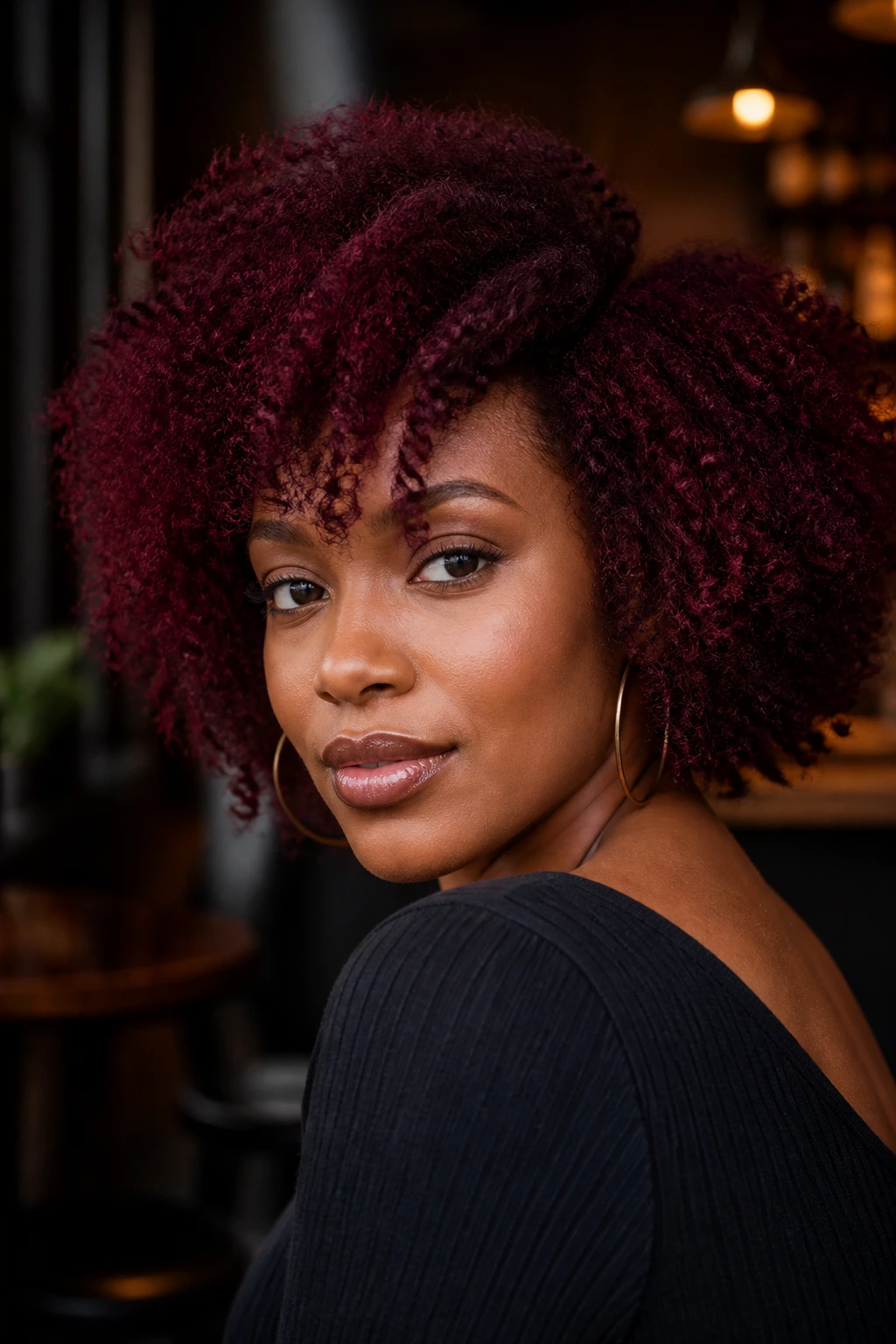 Close-up of deep burgundy hair on a real woman
