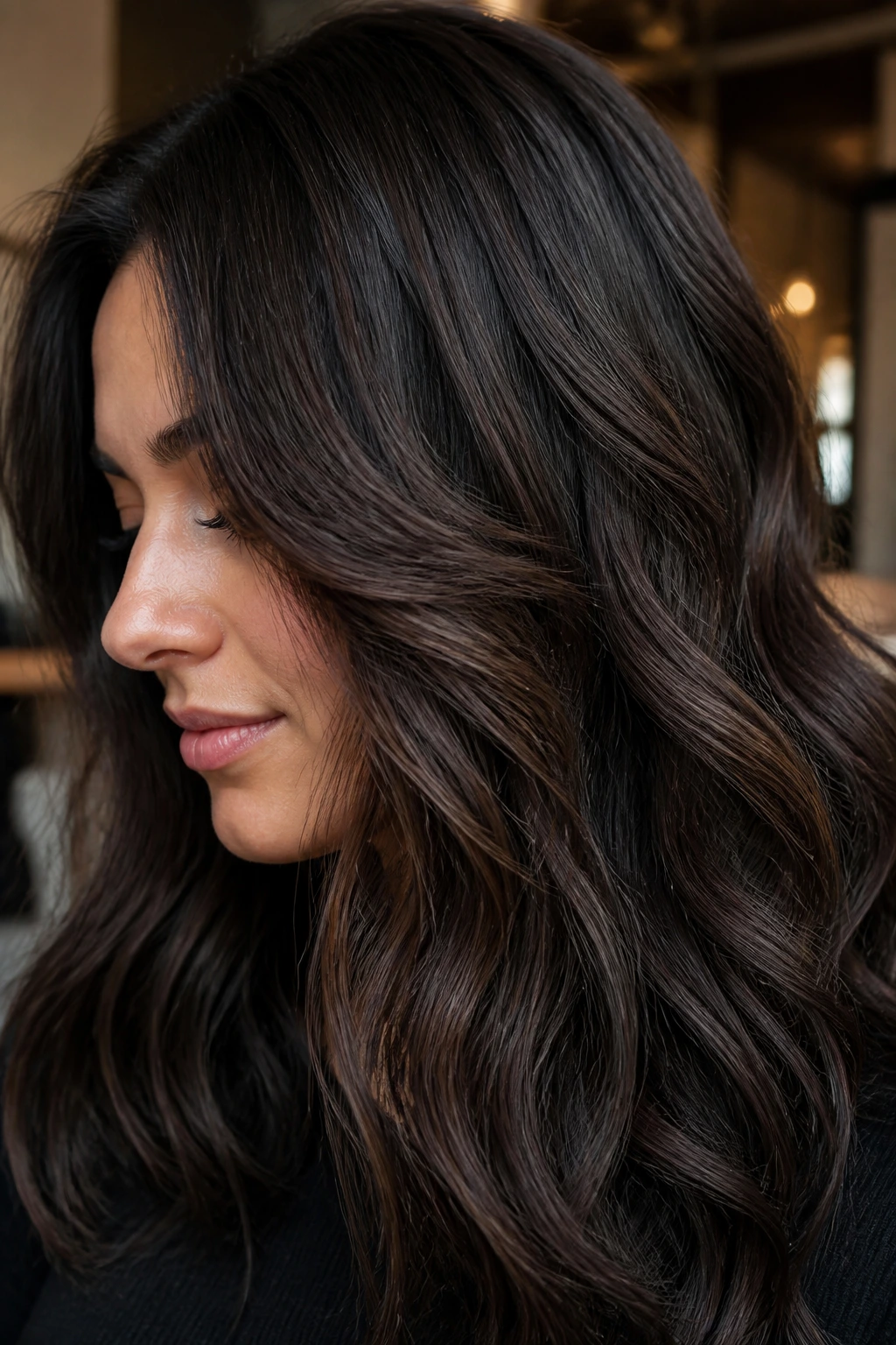 Close-up of brunette with deep truffle lowlights showing depth and texture