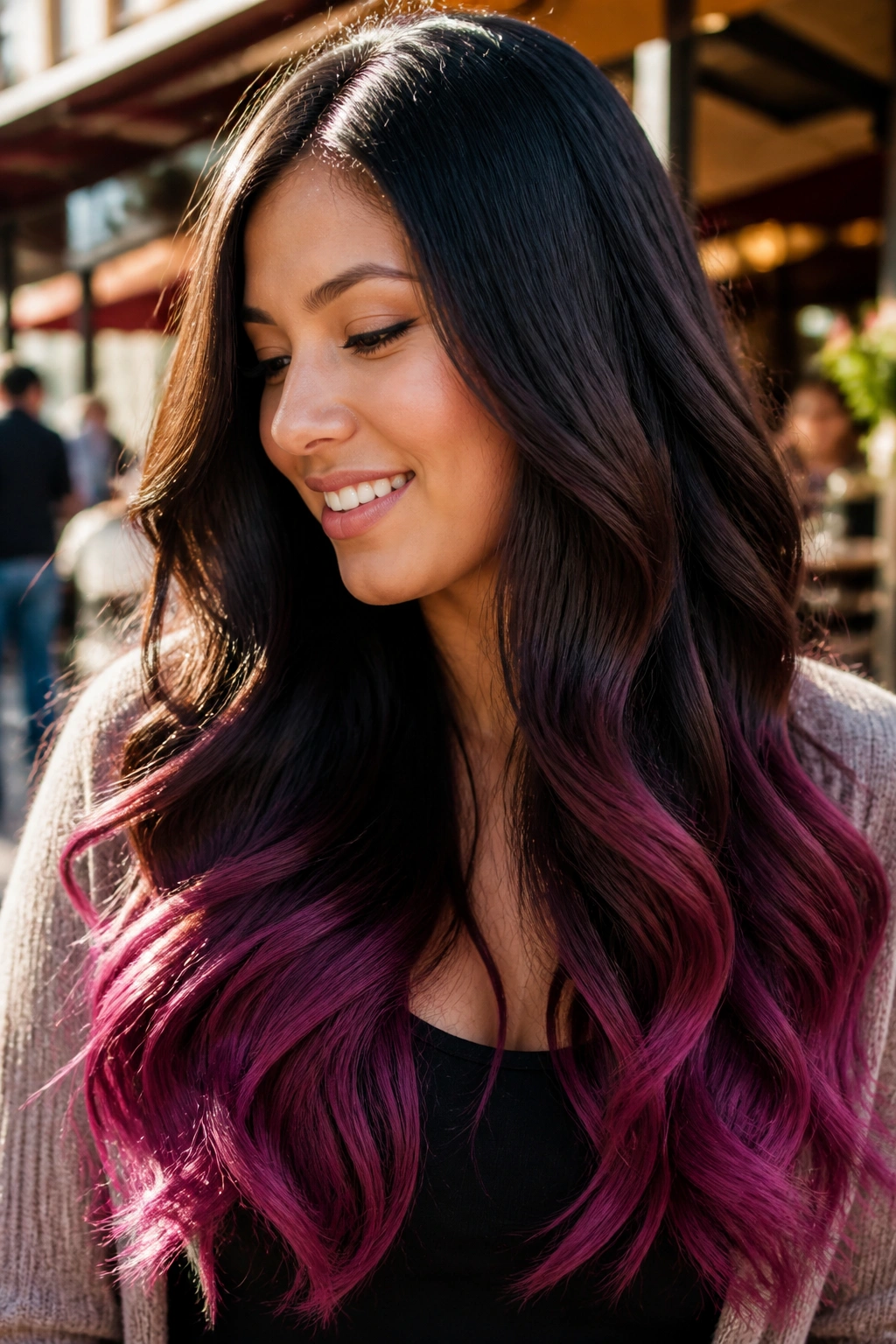Close-up of long hair with cherry-violet dip dye at the ends
