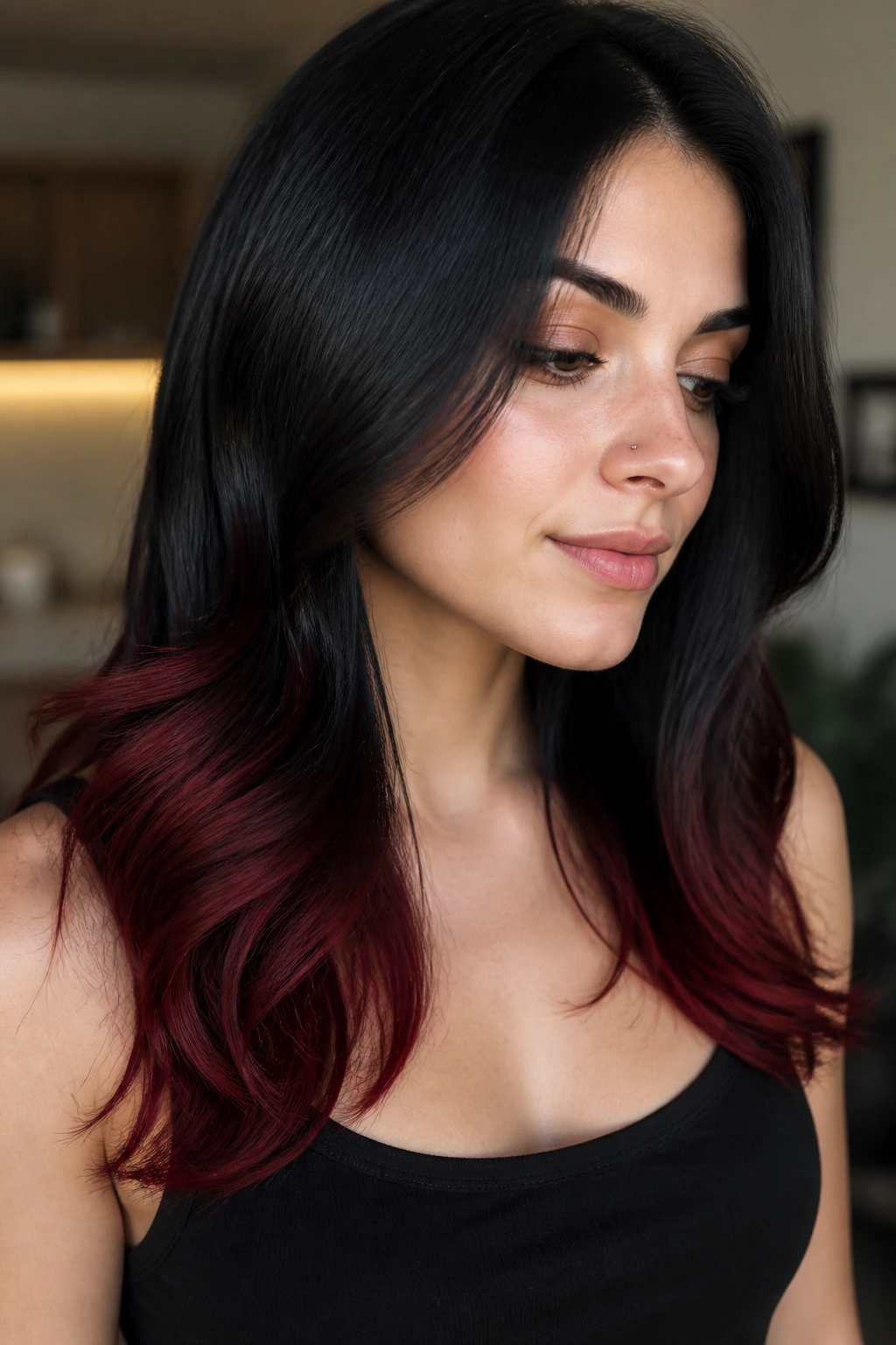 Close-up portrait of a real person with glossy black hair and cherry glaze ends