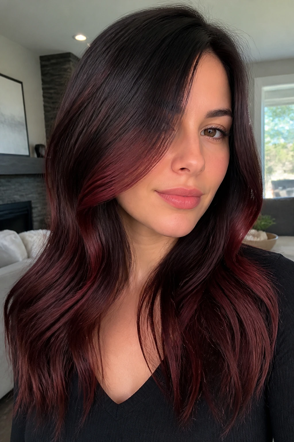 Close-up of a person with graphite burgundy hair and a cherry edge