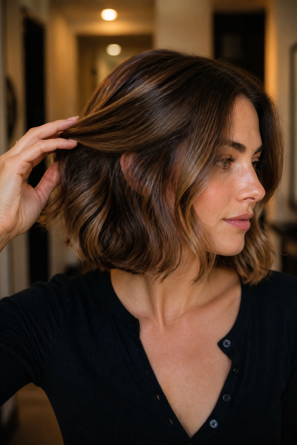 Close-up of a real woman with a grown-out bob and hidden internal layers