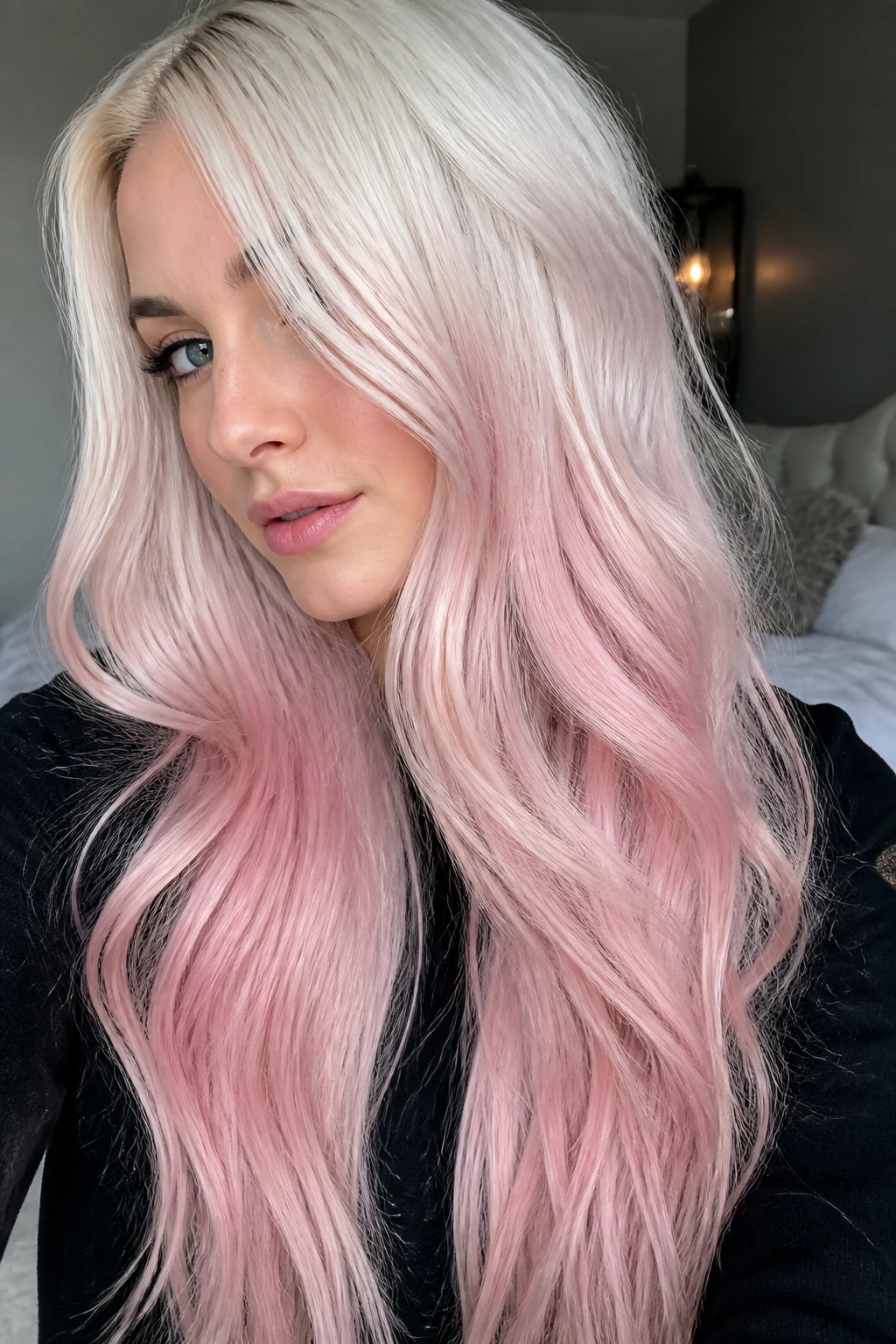 Close-up portrait of icy blonde transitioning to frosted blush ends
