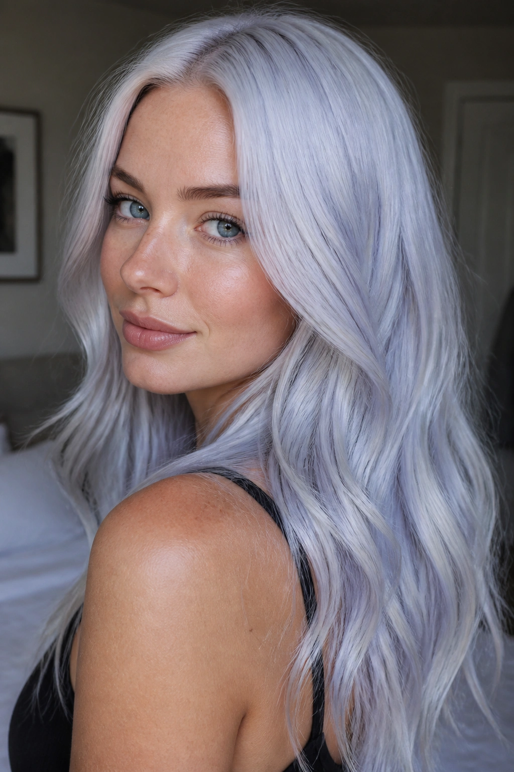 Close-up portrait of a real person with icy blue platinum blonde hair under natural window light.