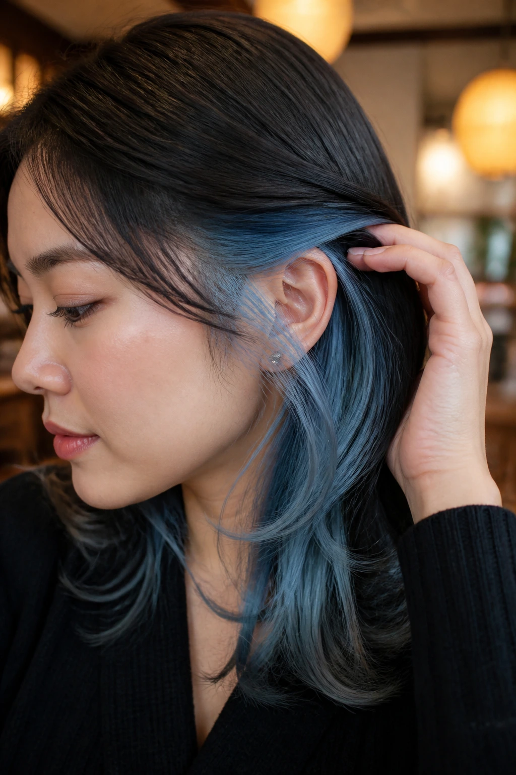 Portrait showing icy blue peekaboo panels beneath a dark top layer