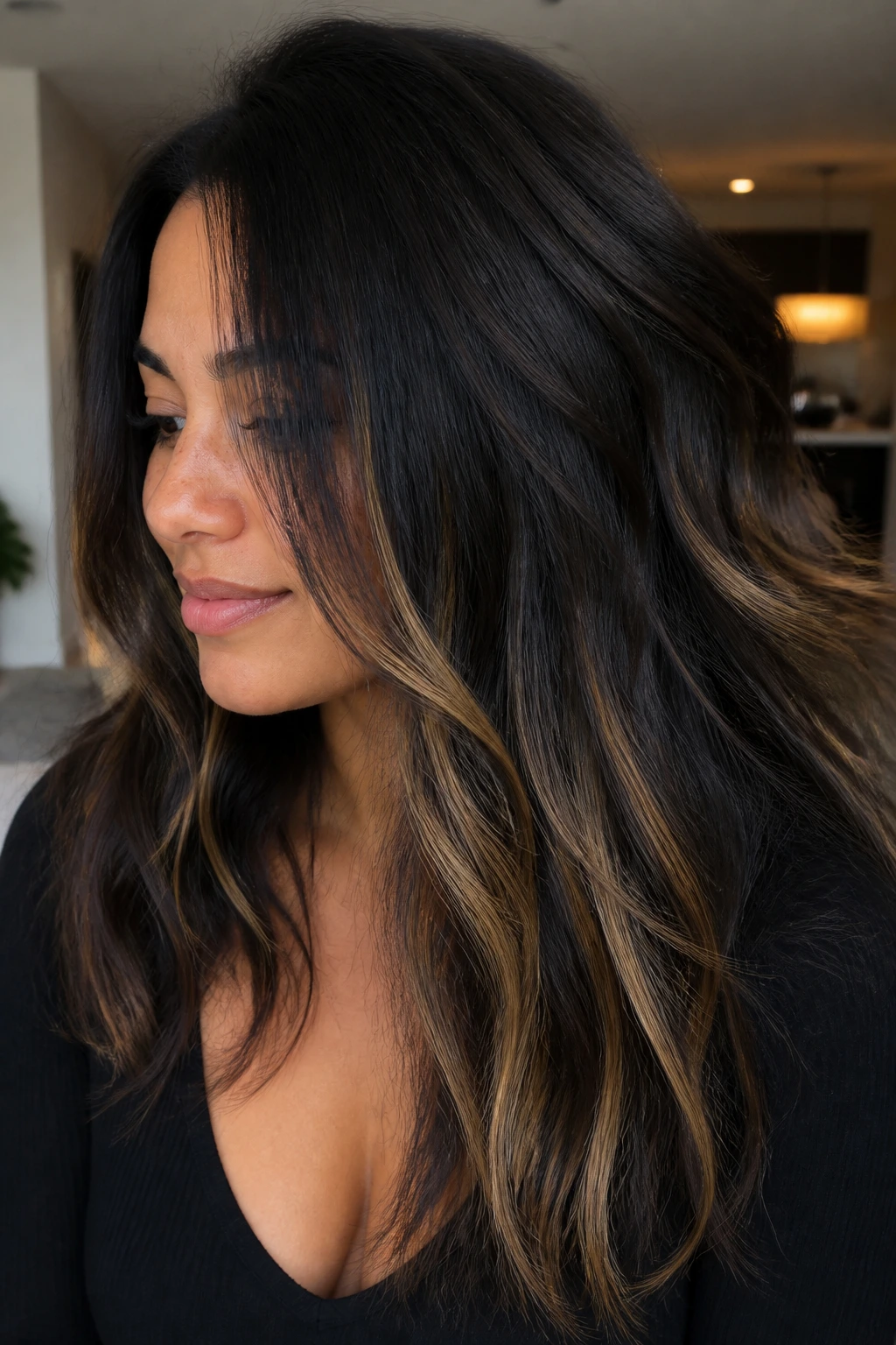 Real woman with invisible highlights in dark hair