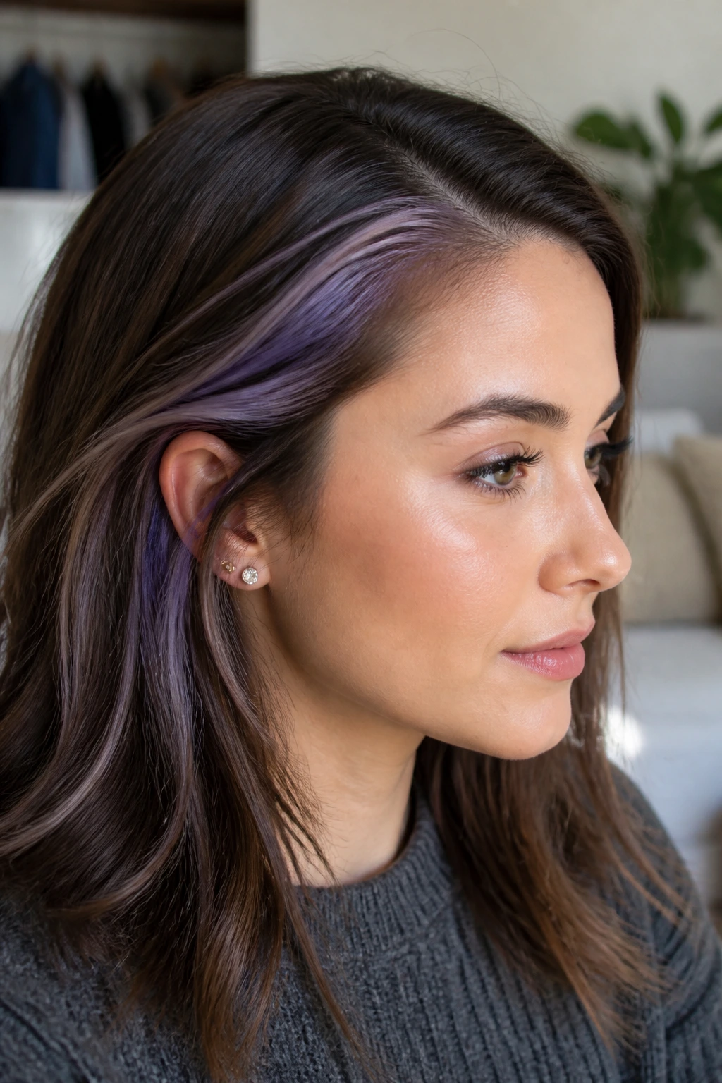 Close-up of lavender accents at temples and part line on real person's hair
