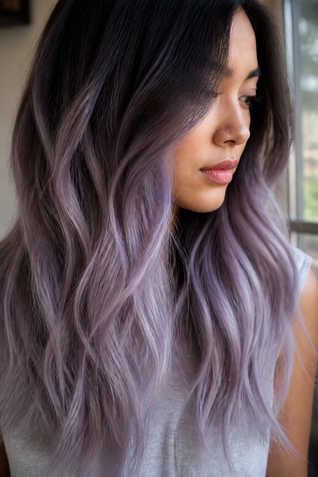 Close-up of Lavender Gray Ombré hair on a real person.