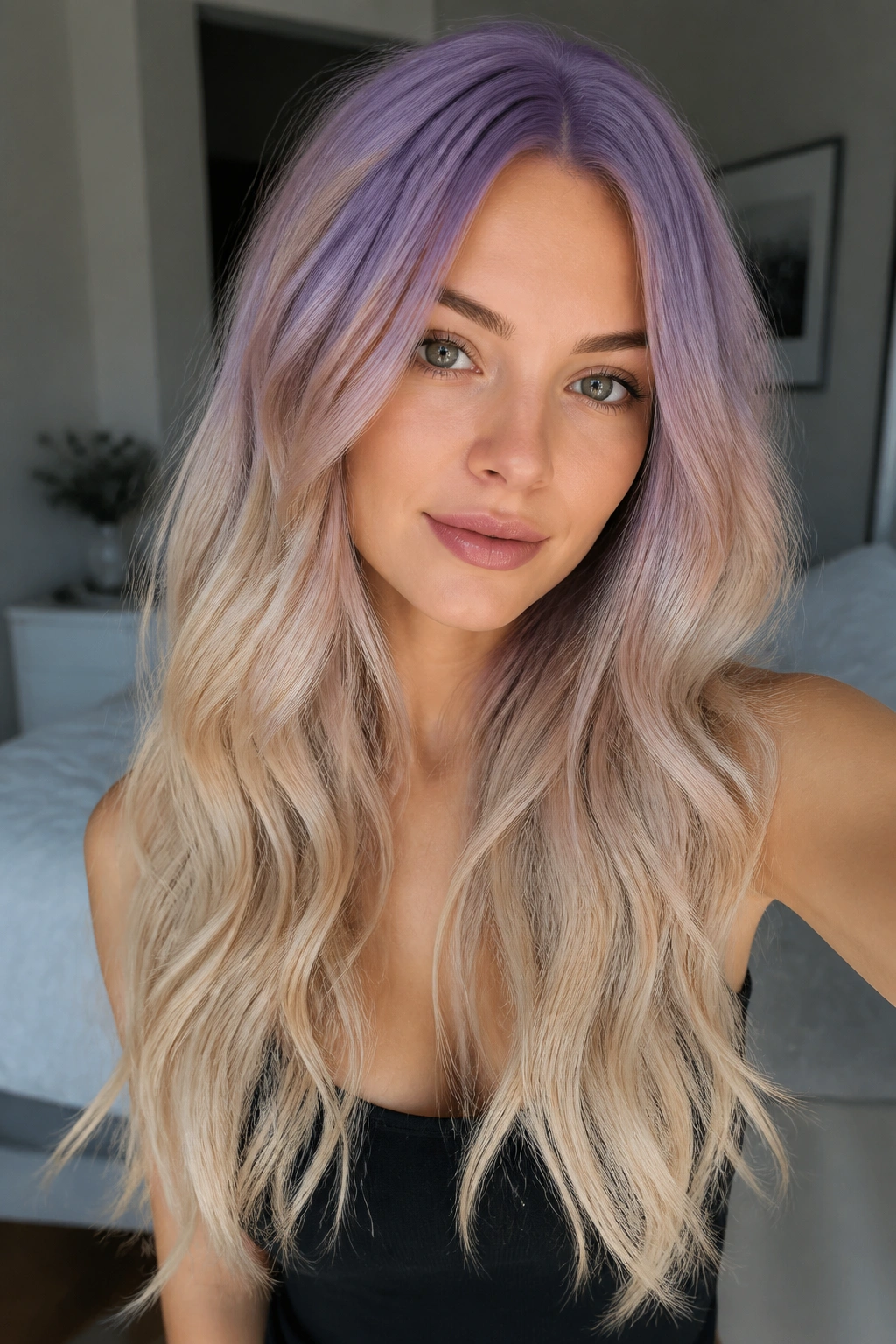 Front portrait of lavender roots fading to blonde ends on long hair