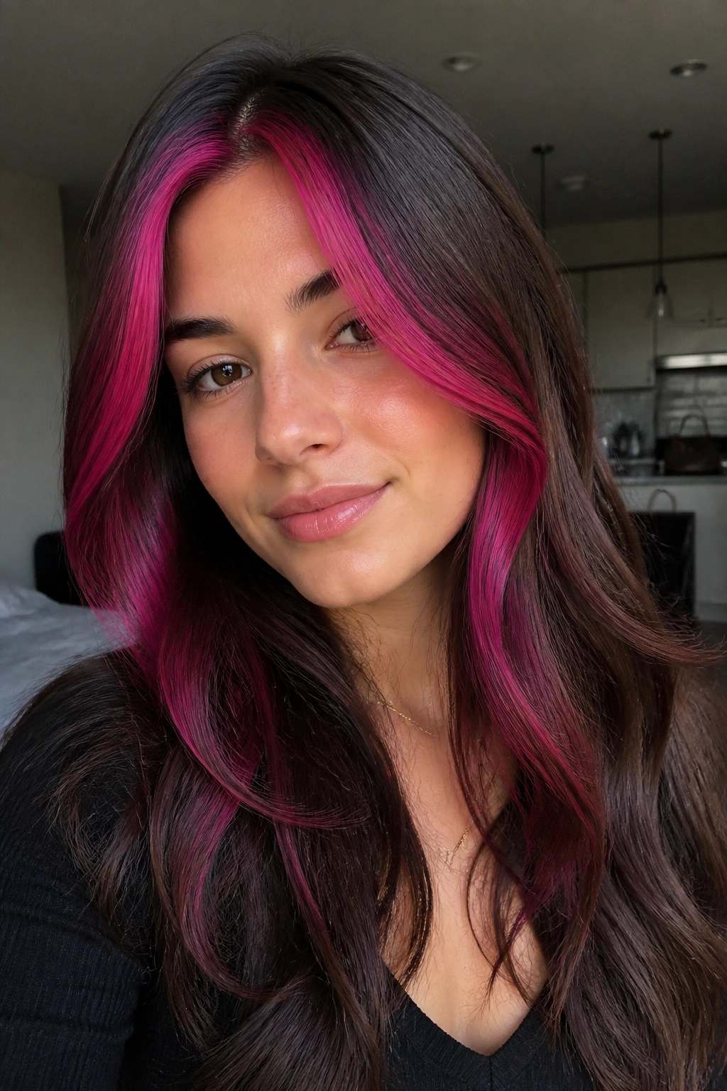 Portrait of a brunette with magenta money pieces at the front