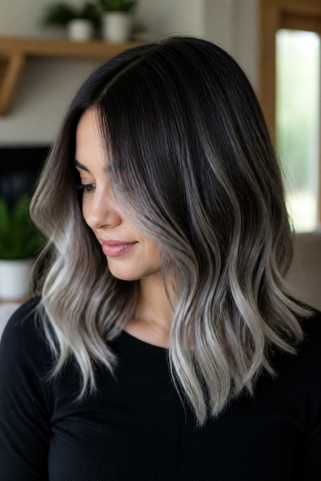 Close-up of brunette hair with melted roots and silver ends