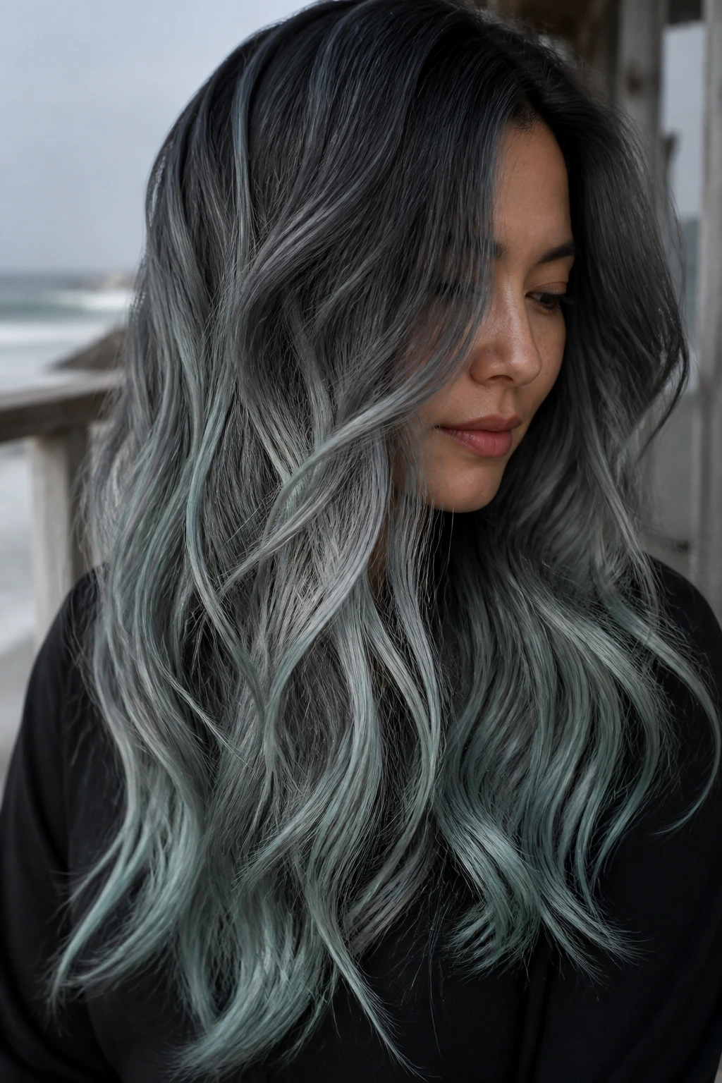 Long dark-to-silver mermaid ombre hair with sea-glass tones.
