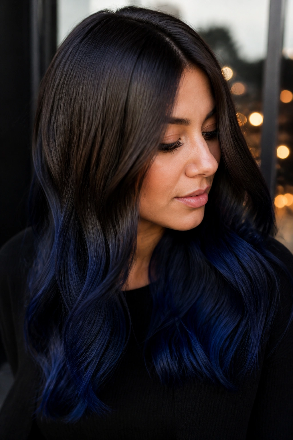 Portrait of a woman with midnight blue ombre on dark brown hair