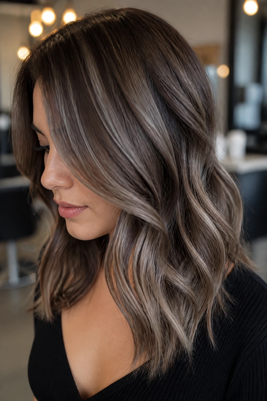 Close-up portrait of mink ash balayage on a real person