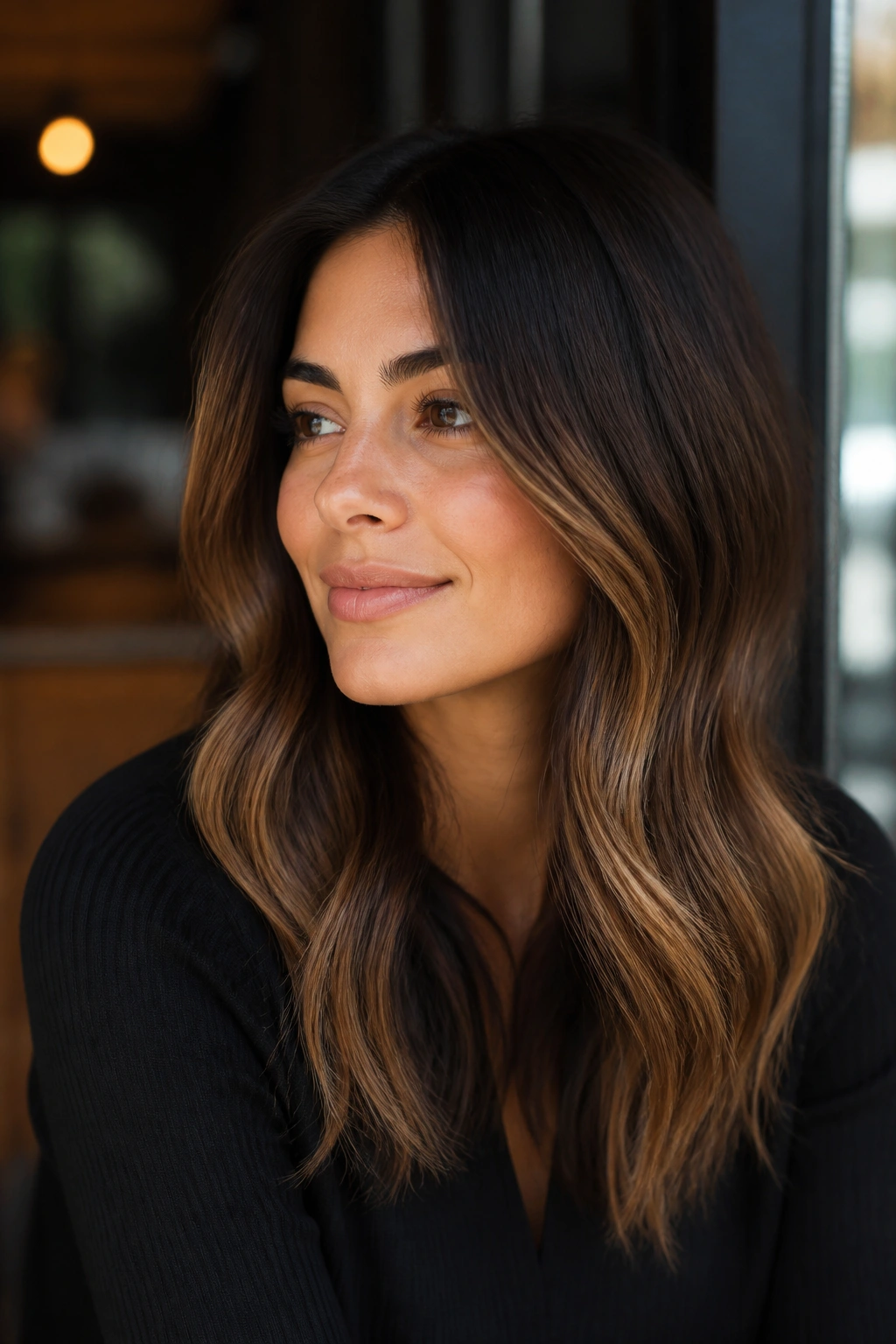 Mocha brown hair with soft caramel veils on a real person.