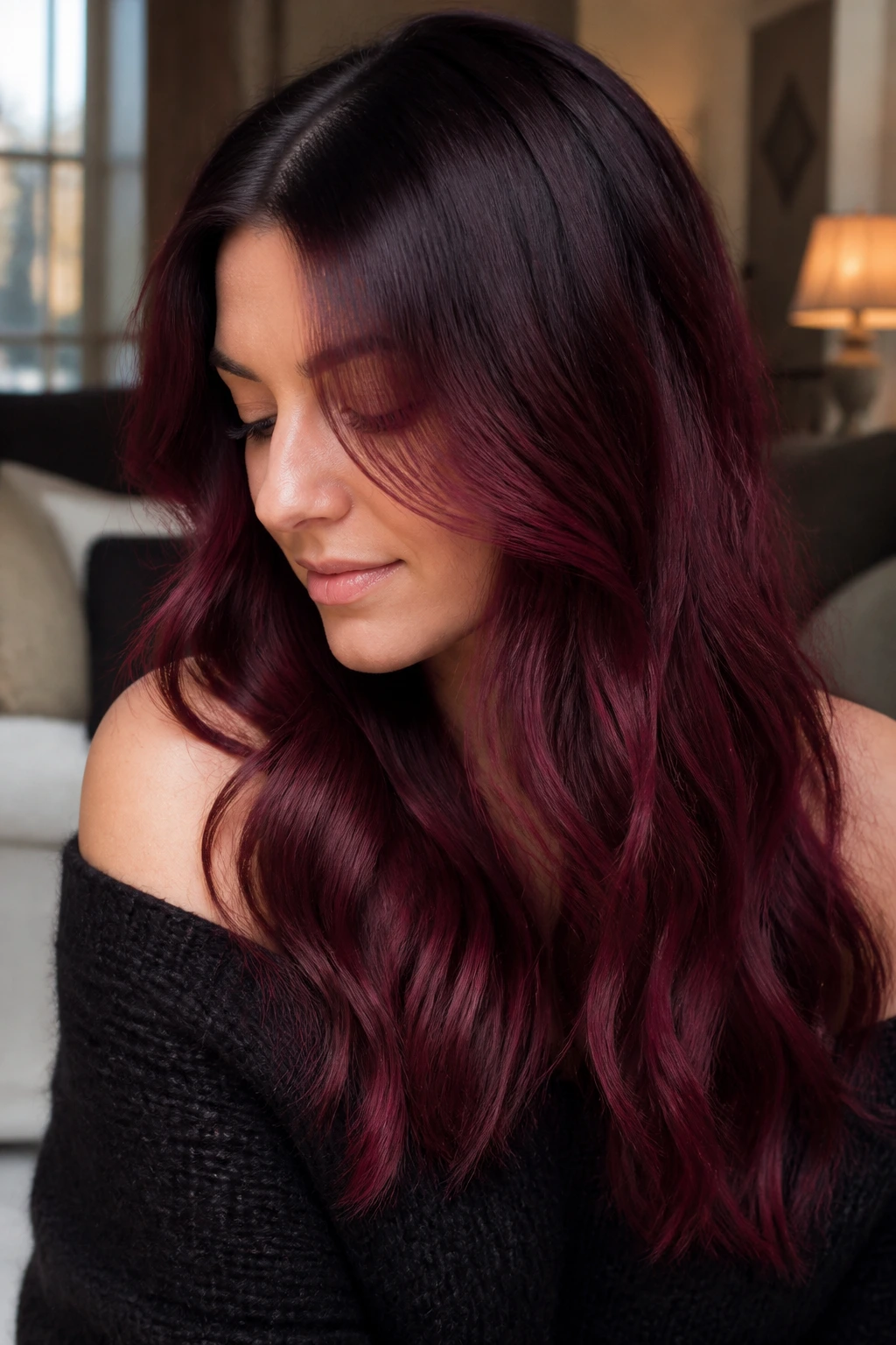 Close-up of real woman with mulberry shadow roots transitioning to burgundy