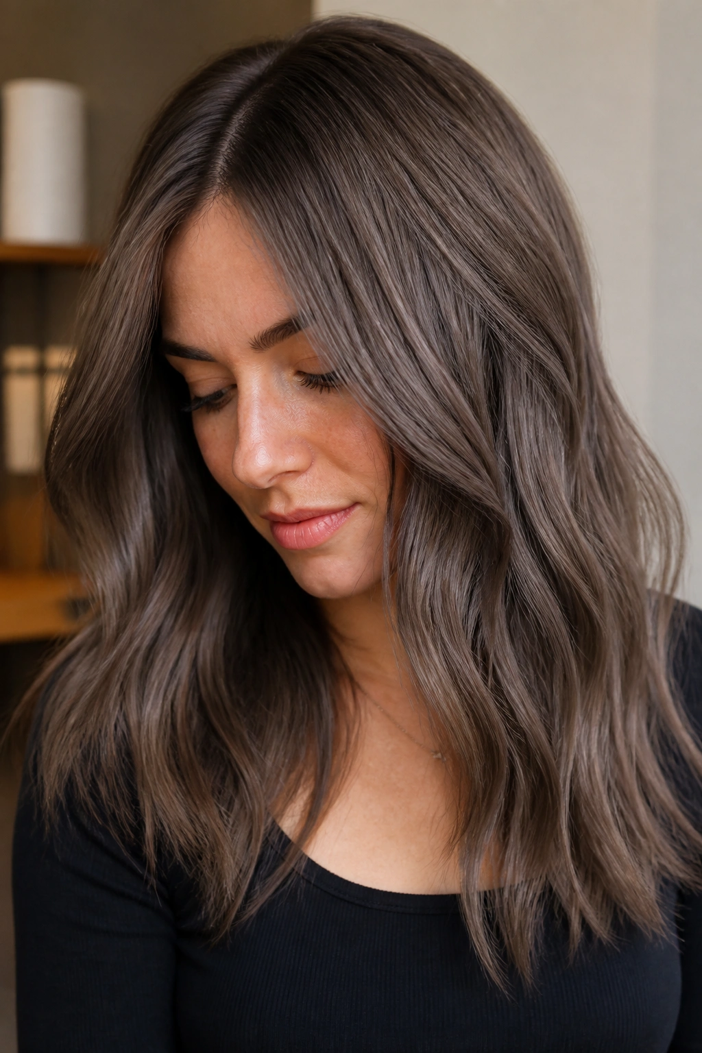 Close-up portrait of a person with mushroom ash brown hair in natural light