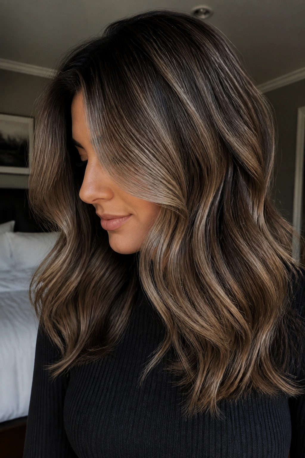 Close-up of a real person with mushroom blond on cool brown hair in soft natural light