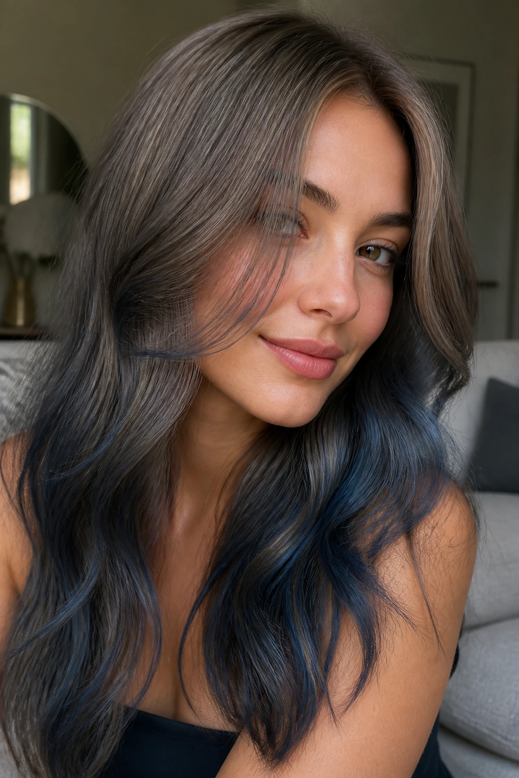 Portrait of a woman with mushroom brown hair and blue glaze.