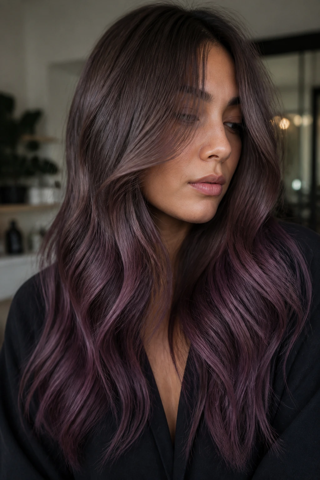 Close-up of mushroom brown to dusty plum ombre on a real woman