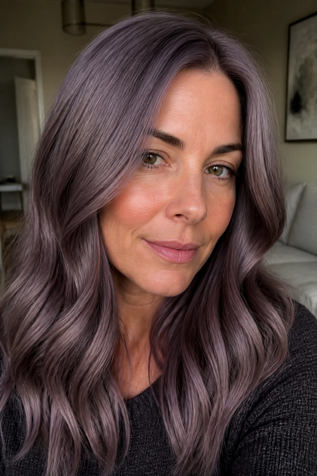 Close-up of a real person with mushroom grey hair and orchid gloss.