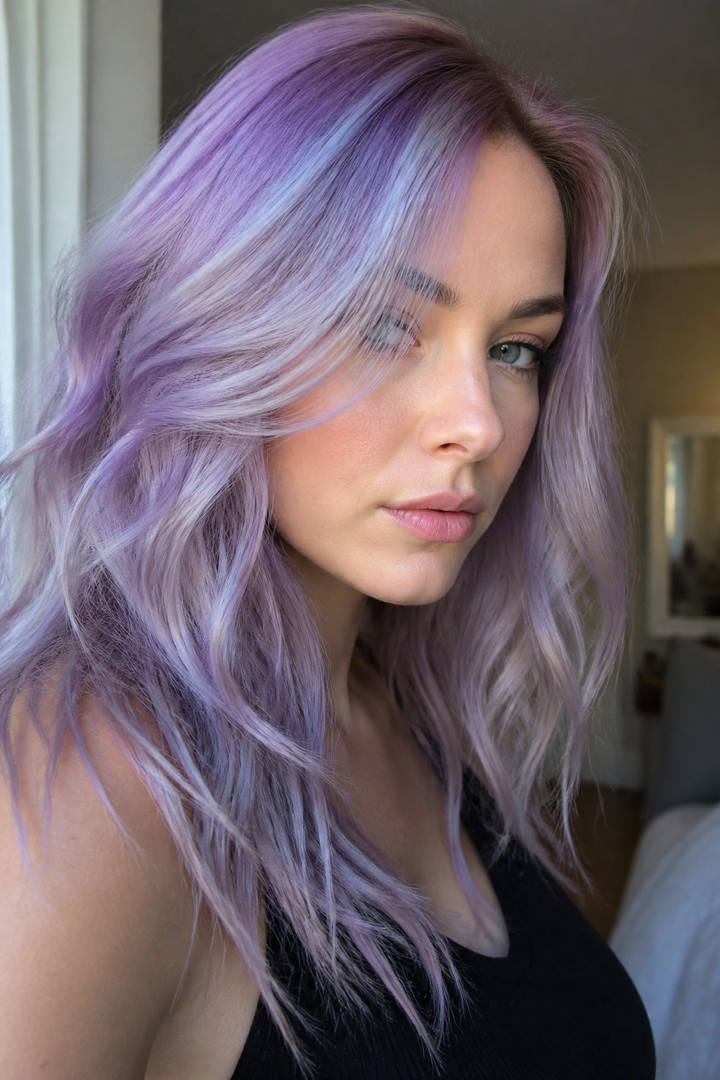 Portrait of a person with opal purple hair shifting with light
