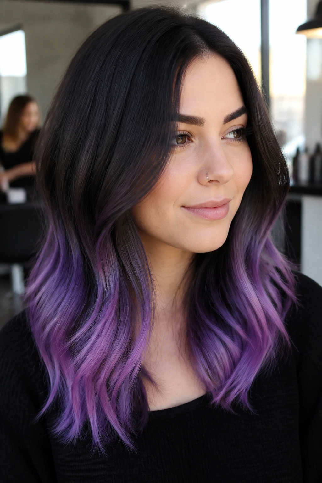 Close-up portrait of a real person with dark base hair and orchid lilac ends