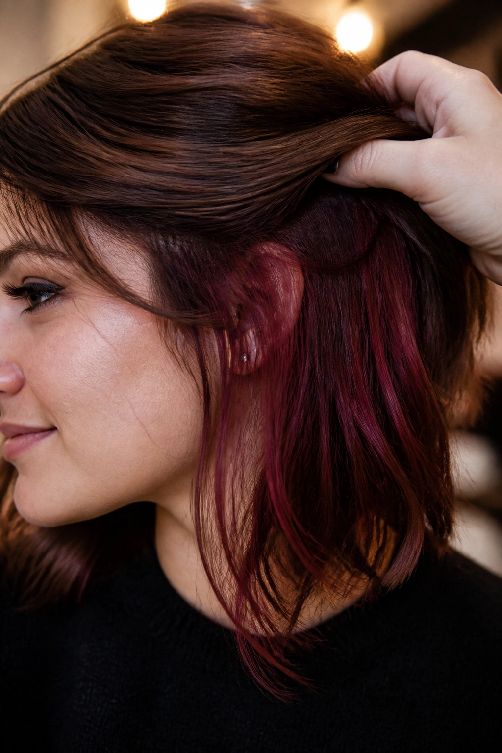 Close-up of a real woman with cherry peekaboo panels under the top layer